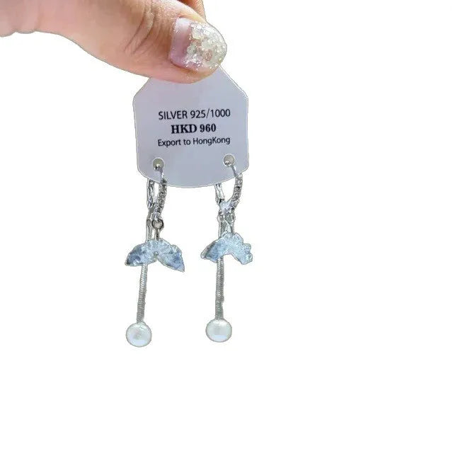 Geometric-shaped women's earrings with heart and star rhinestones and long tassel drops.