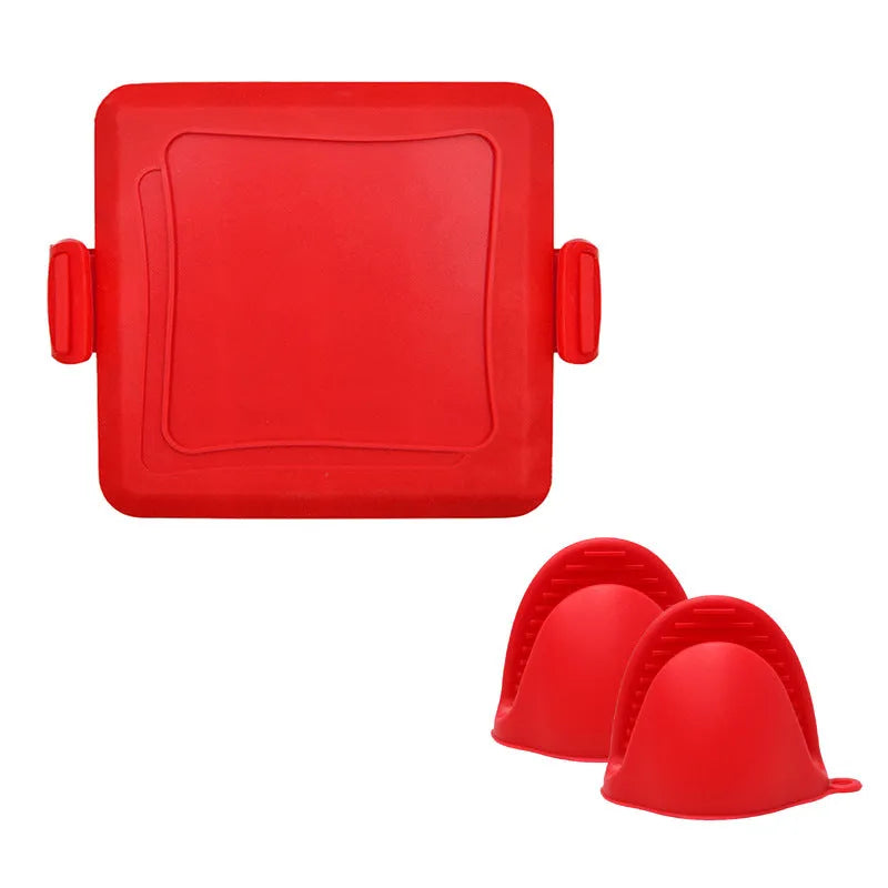 Red silicone baking tray with matching anti-slip oven gloves on kitchen counter