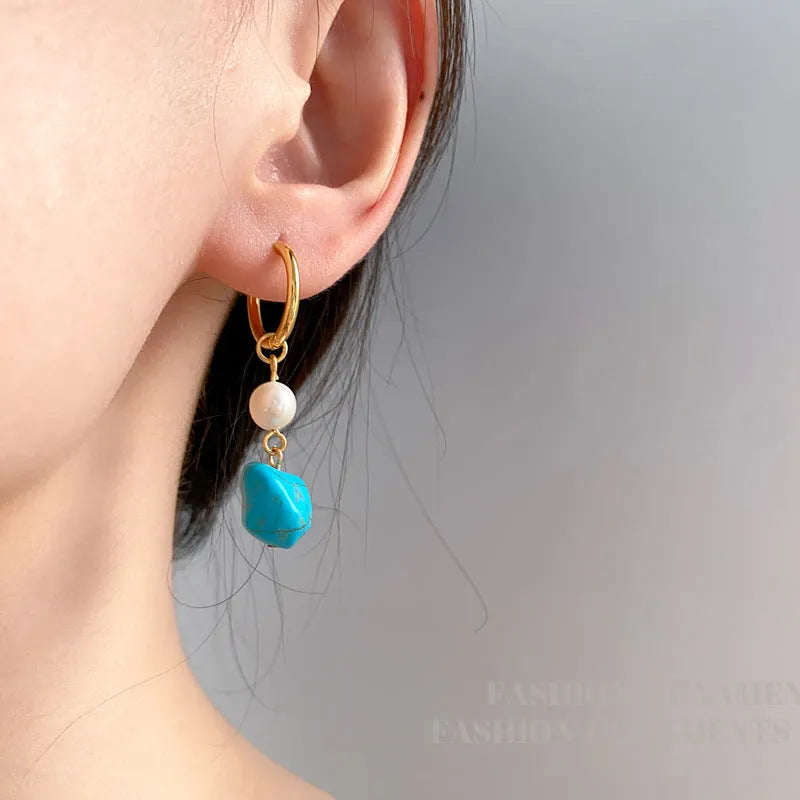 Copper geometric ear clips with irregular turquoise stones and cultured pearls, showing both short and long dangle styles