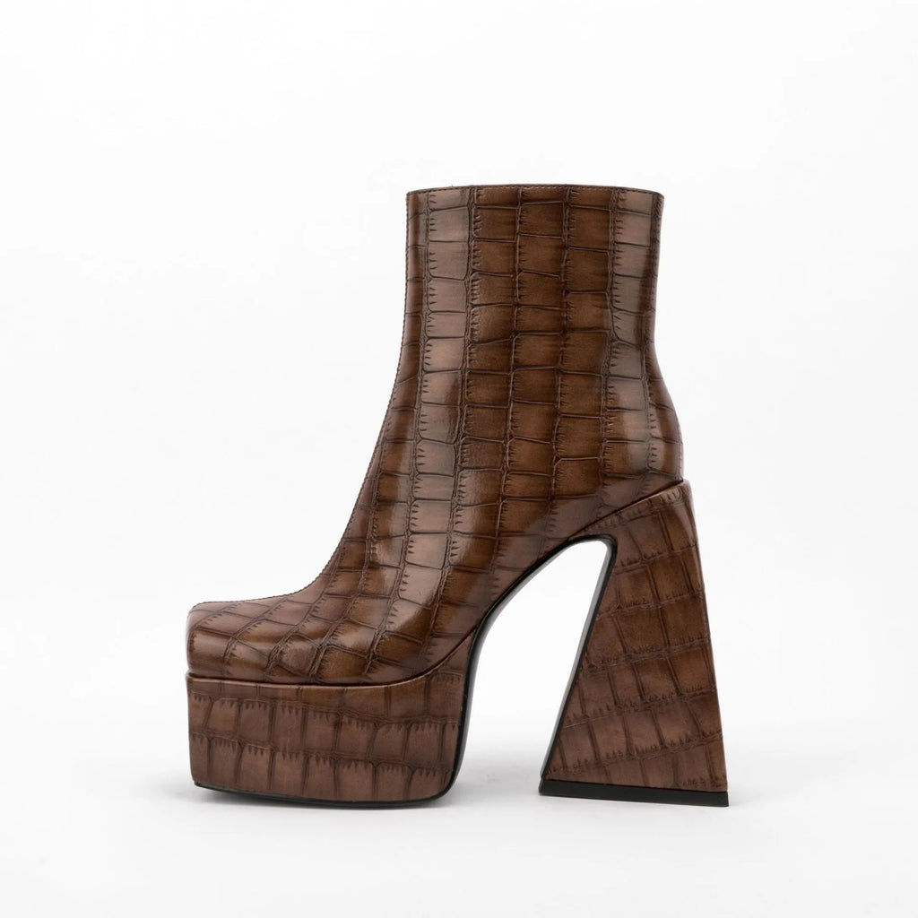 Women's artificial PU leather ankle boots in beige with a super high heel.