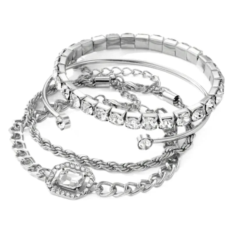 Four geometric bracelets with square diamond motifs on metal chains in gold colour