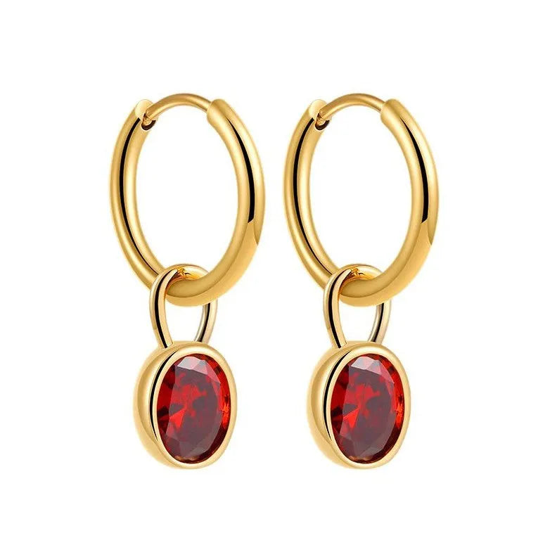 Close-up of women's retro oval zircon earrings in copper, showing the elliptical gemstone setting.
