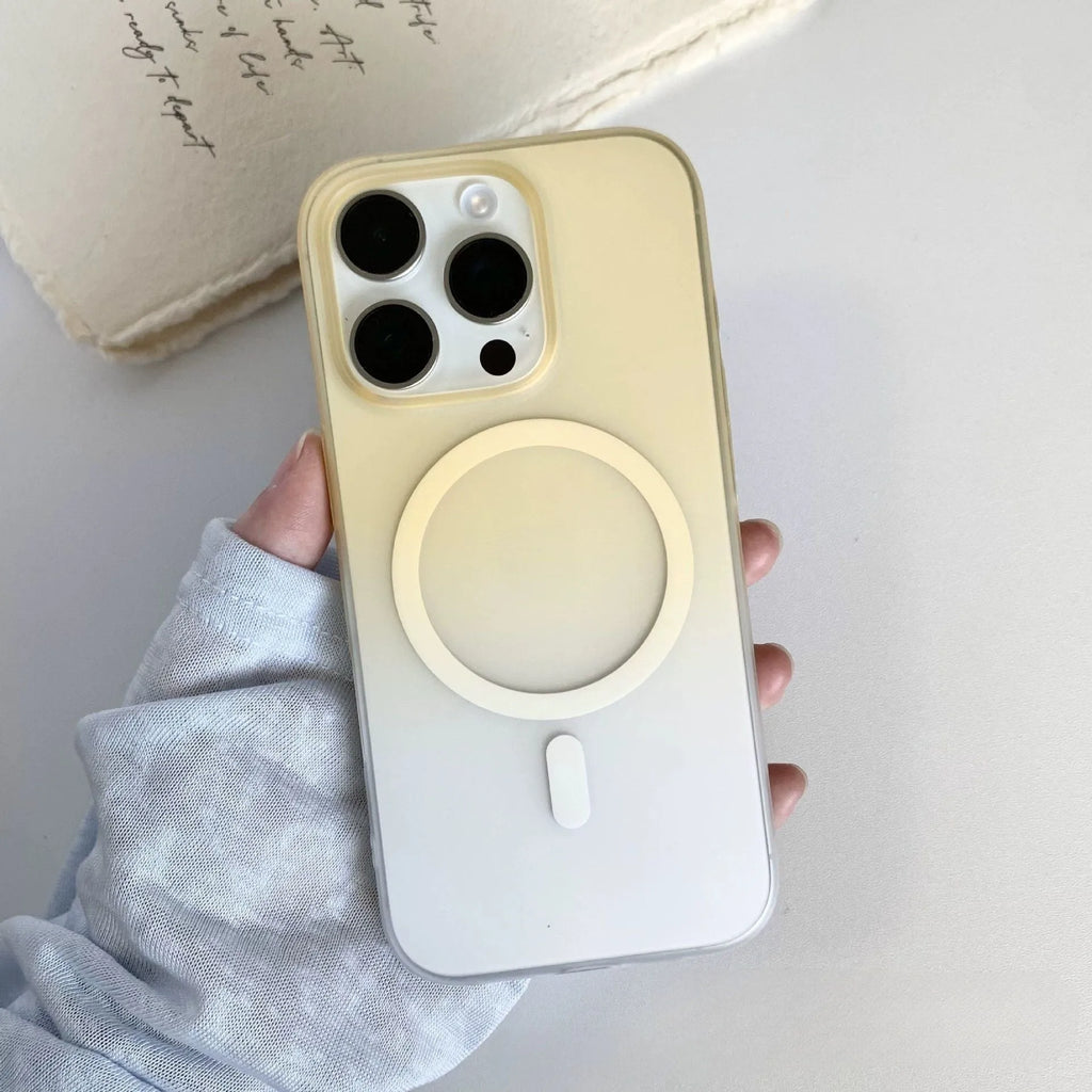 Gradient frosted magnetic suction case for iPhone on a table, showing ultra-thin profile and colour blend.