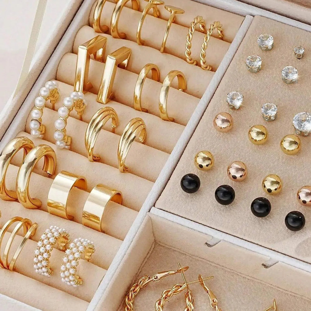 108-piece gold and yellow geometric round pearl earrings multipack on a flat surface.