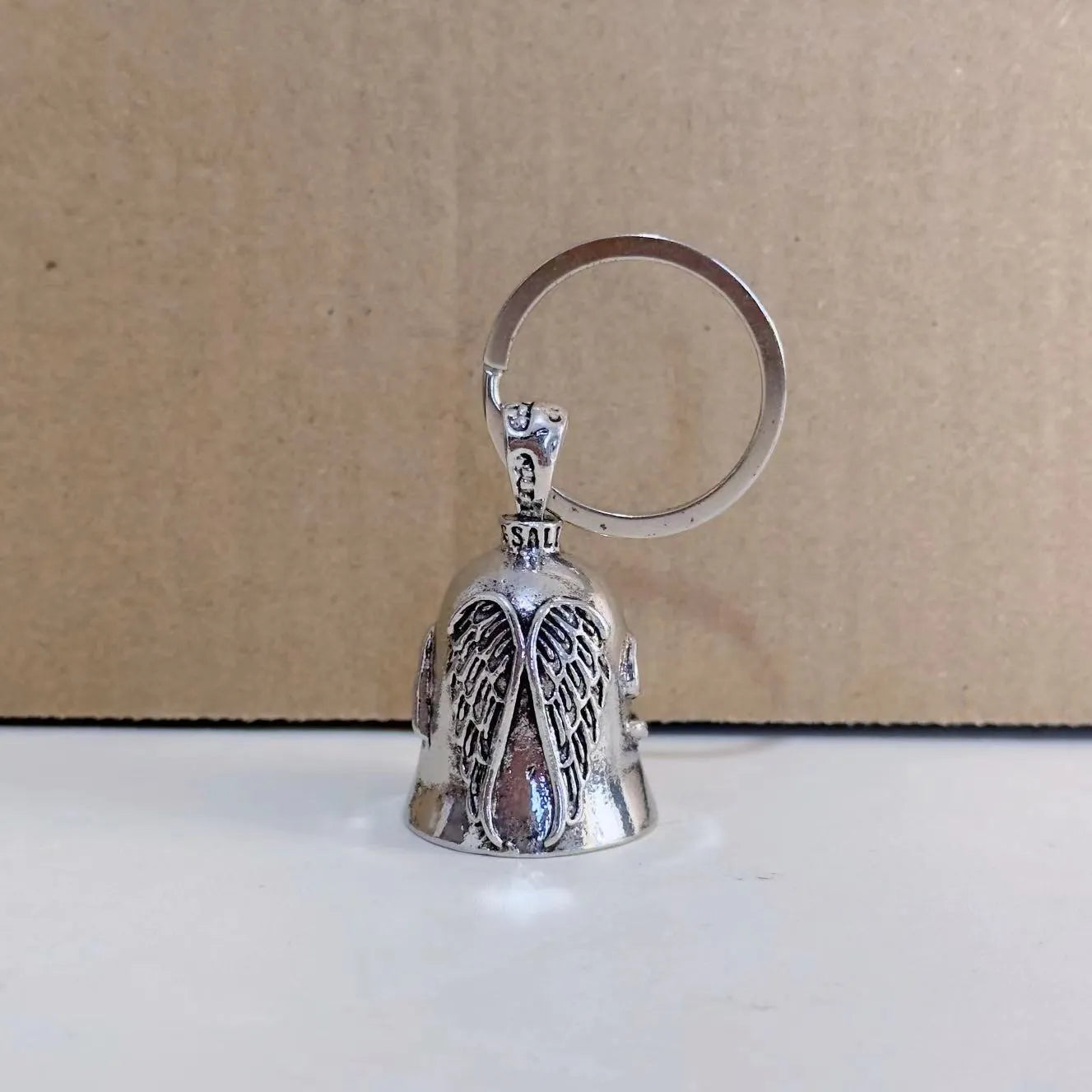 Angel feather necklace and keychain set with antique white finish and detailed wing design