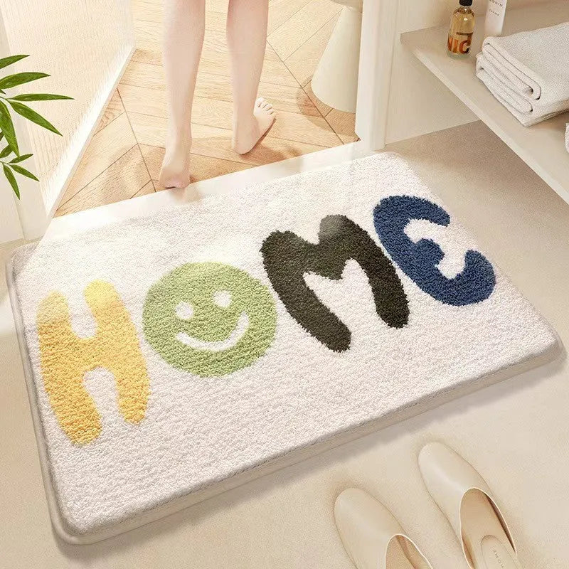 Square imitation cashmere carpet mat with Rainbow pattern and plastic dirt-resistant bottom.