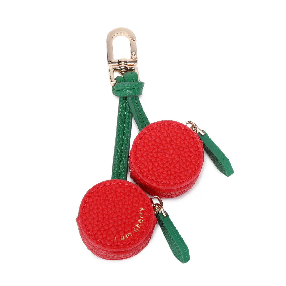 Mini solid colour PU leather coin purse keychain in cherry red, blueberry blue, or orange.
