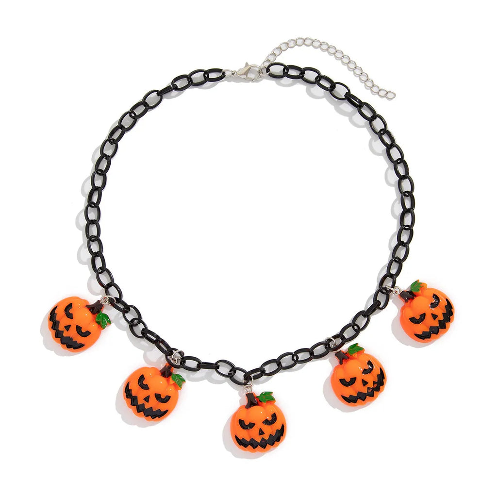 Halloween necklace with a colourful acrylic ghost and pumpkin cartoon pendant on a chain.