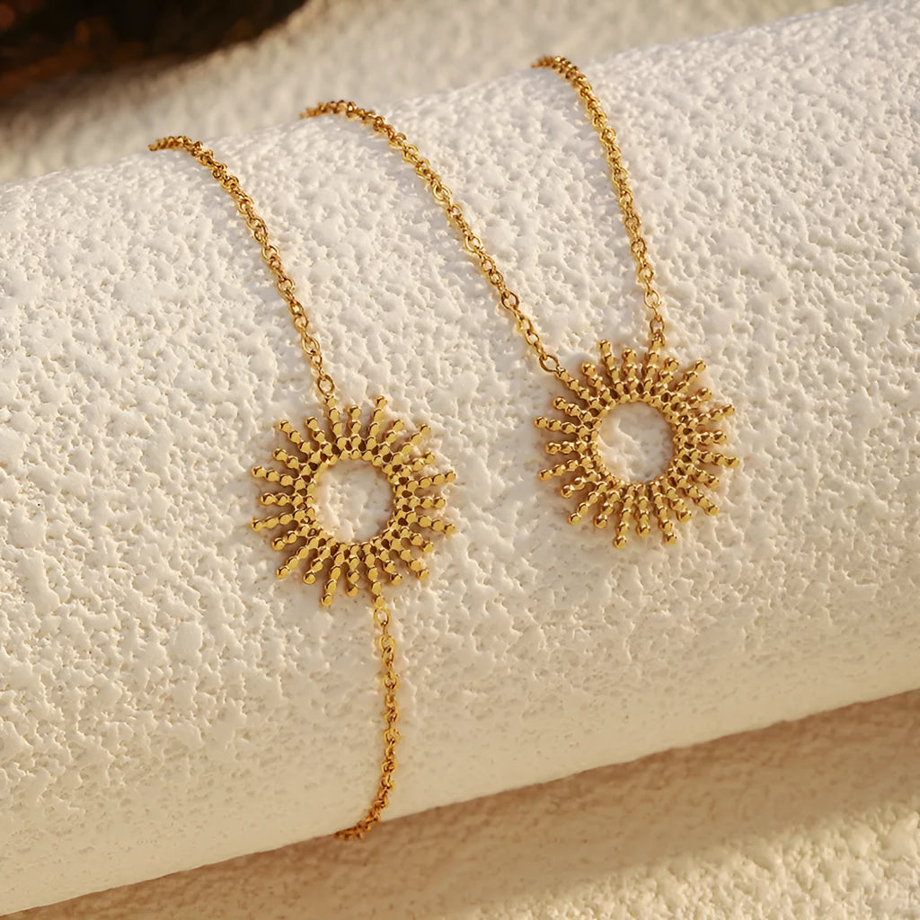 Gold sunflower geometric jewellery set with necklace and bracelet on stainless steel