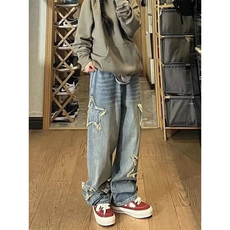 Blue high-waist straight-leg women's jeans laid flat, showing the waistband and leg cut.