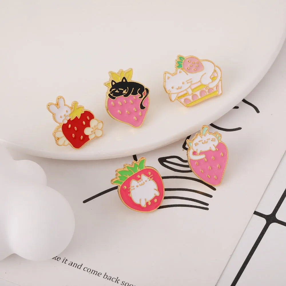Alloy metal brooch with cat strawberry cake and dripping oil design in five colour options