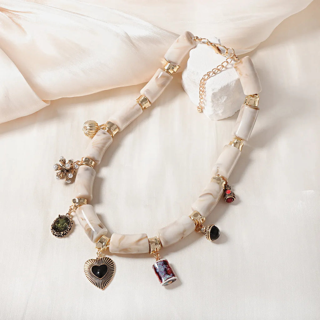 Bamboo resin heart-shaped pendant necklace with electroplated metallic finish on adjustable chain
