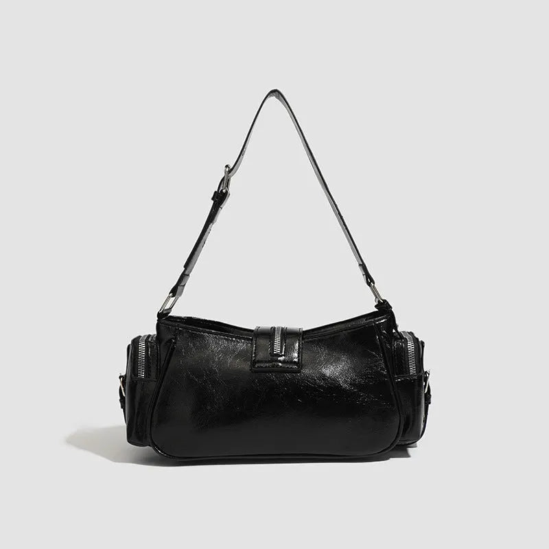 Black retro dumpling-shaped handbag with oil wax leather and multiple internal compartments