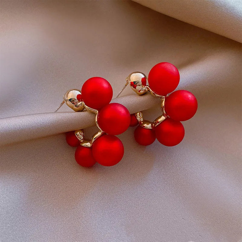 Red bell-shaped alloy drop earrings for women, also available in white
