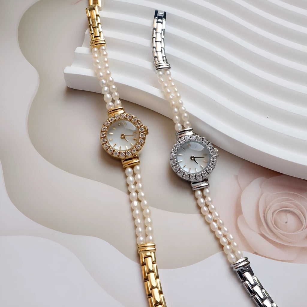 Light gold women's bracelet watch with freshwater pearls and a round dial