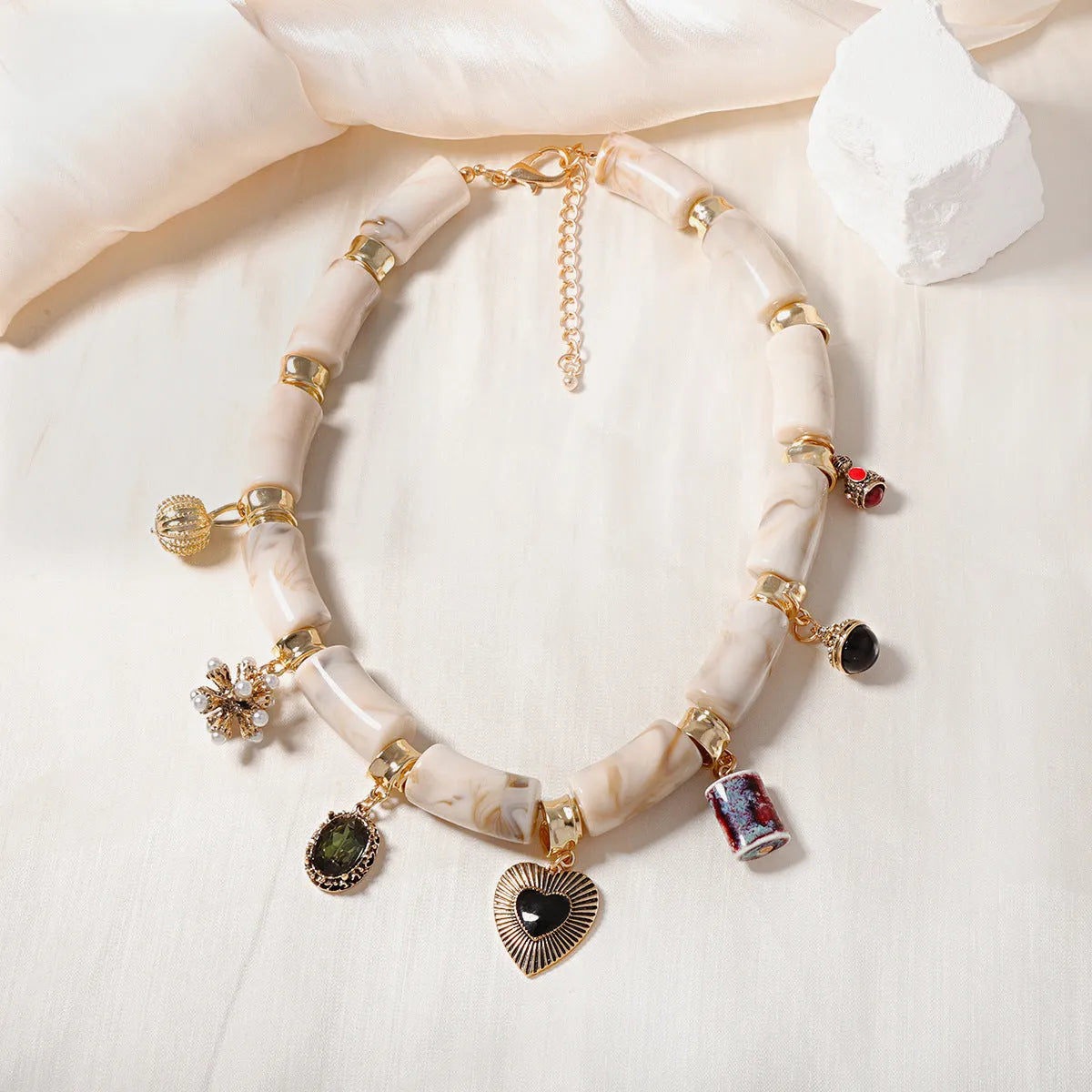 Bamboo resin heart-shaped pendant necklace with electroplated metallic finish on adjustable chain