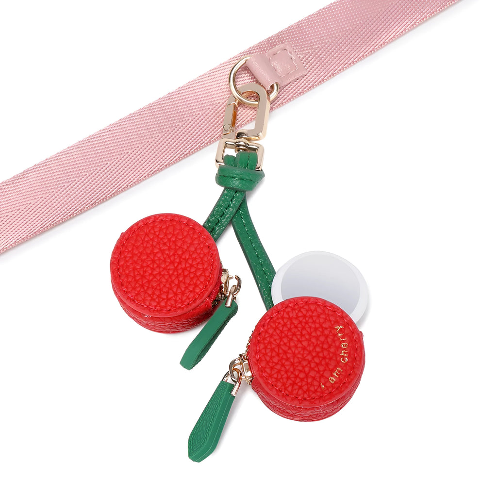 Mini solid colour PU leather coin purse keychain in cherry red, blueberry blue, or orange.