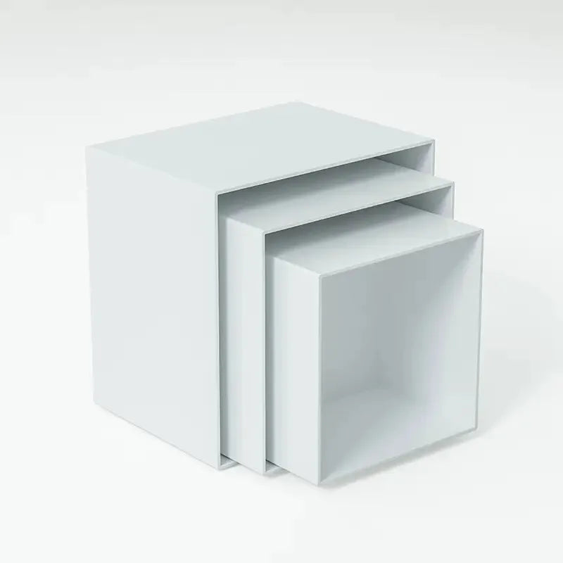 White plastic suit cube dessert display stand 6-piece set arranged in tiered configuration on tabletop