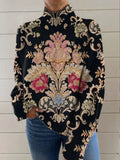 Black 3D pattern printed turtleneck long sleeve loose fit sweater on a hanger.