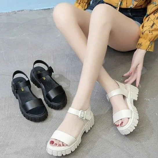 Women's beige peep toe platform sandals with an adjustable ankle-strap buckle closure.