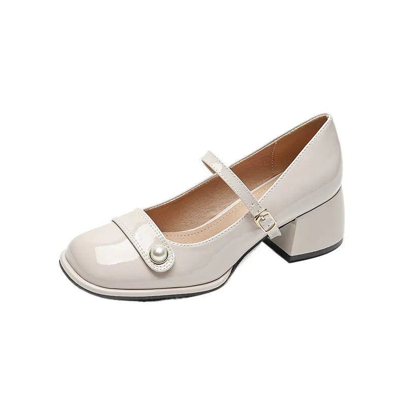 Women's apricot patent leather pumps with chunky heel and square toe, showing buckle ankle strap