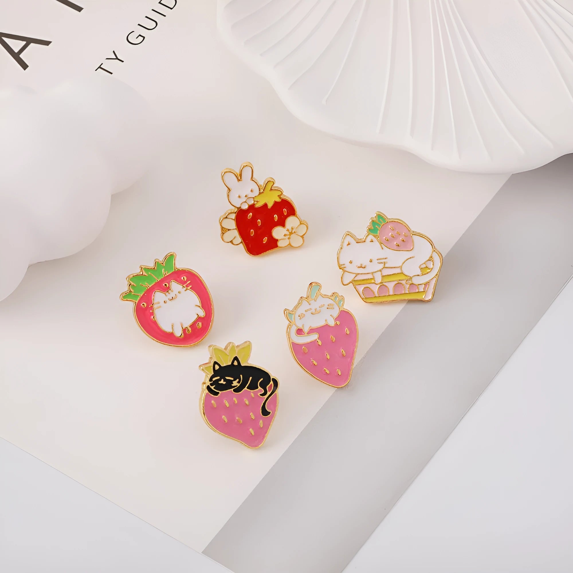 Alloy metal brooch with cat strawberry cake and dripping oil design in five colour options