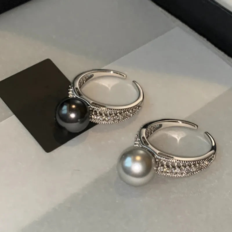 Black pearl open index finger ring with geometric copper design and adjustable opening