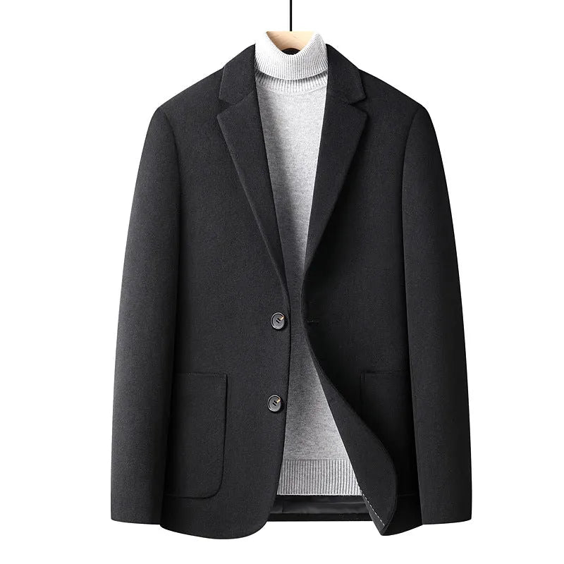 Men's slim fit wool suit jacket in grey, shown on a model, featuring a notched lapel and button front.