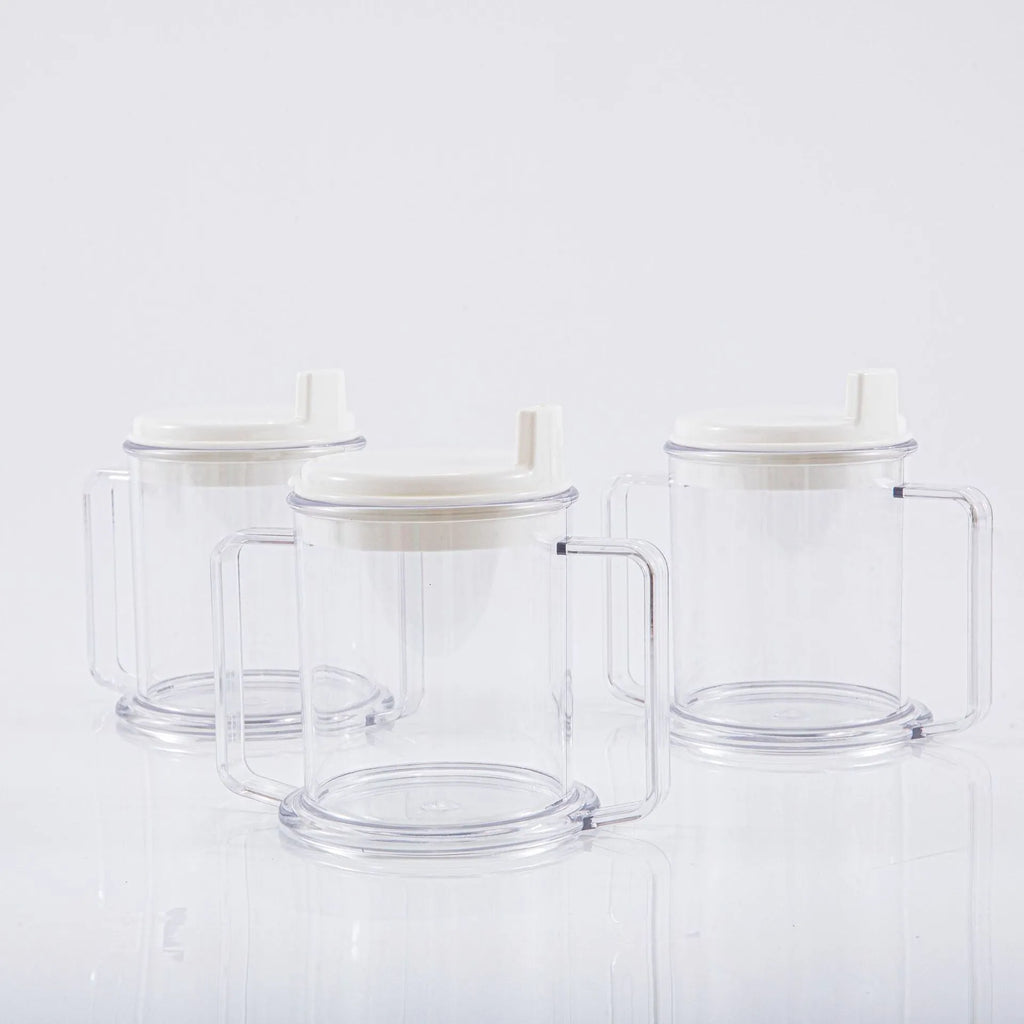 Transparent spill-proof drinking cup with solid colour finish and modern design