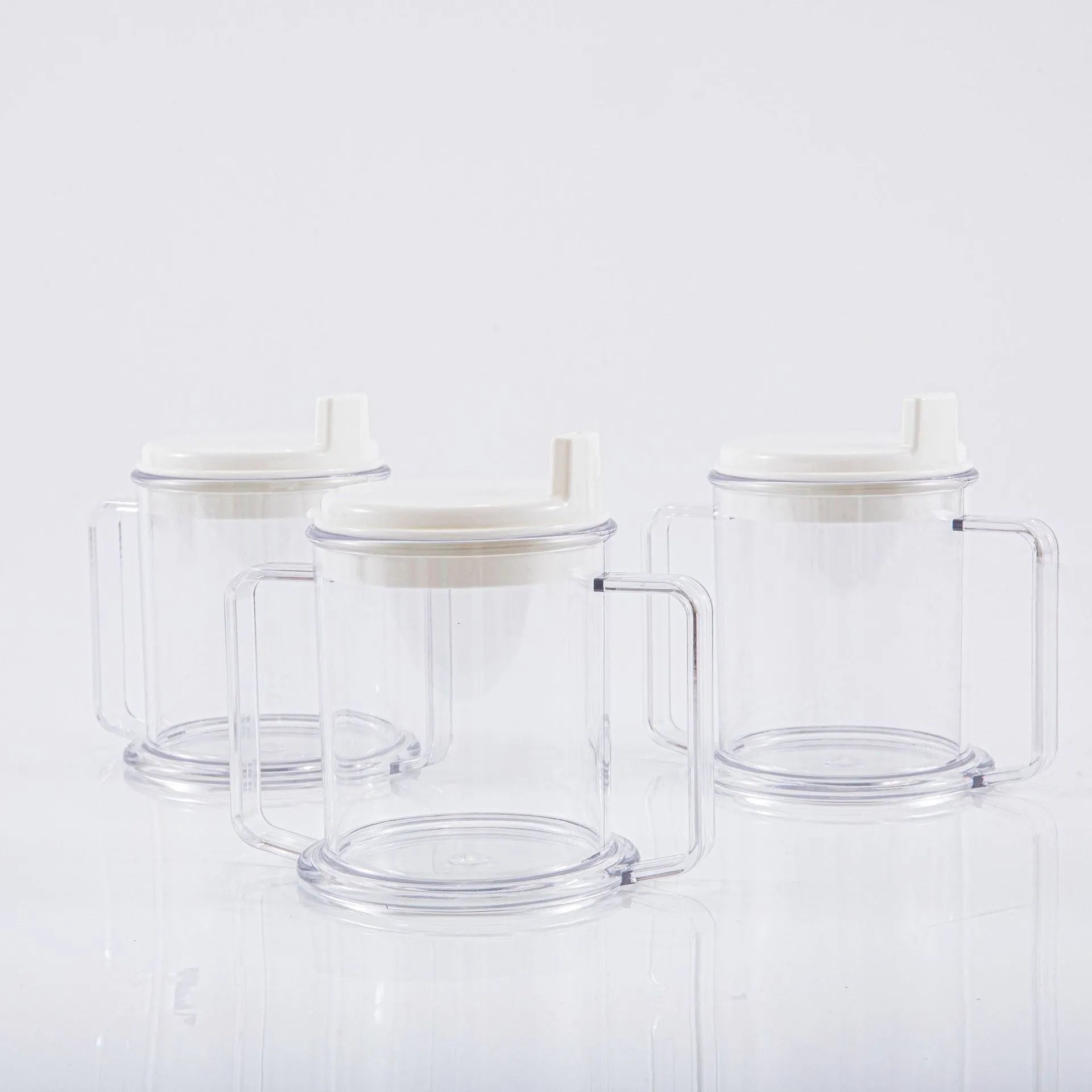 Transparent spill-proof drinking cup with solid colour finish and modern design