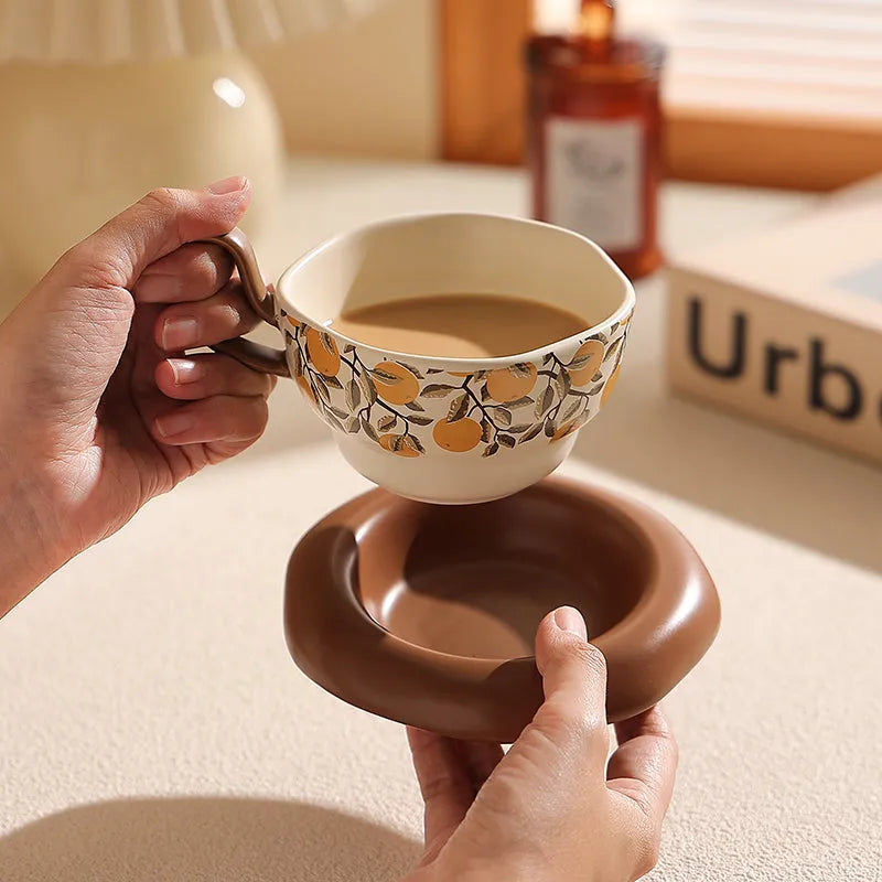 Retro style ceramic coffee cup and saucer set in black or orange colour with 210ml capacity