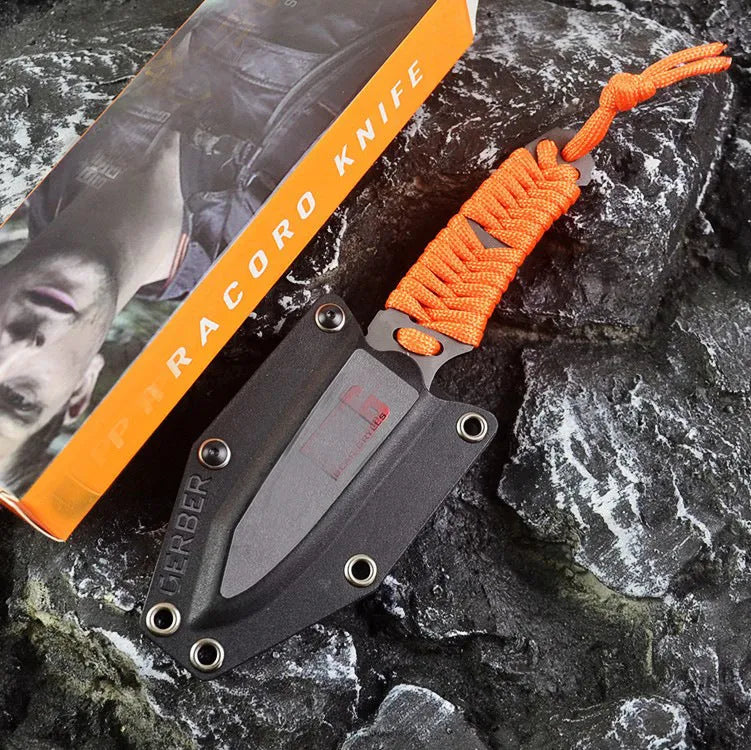 Camping knife with straight blade and rope bound handle showing ABS sheath