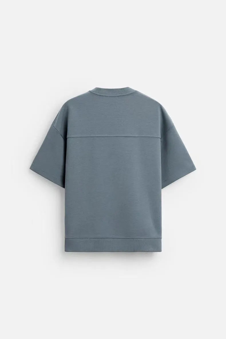 Men's loose fit round collar short sleeve top and matching shorts casual set in blue.