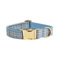 Sky blue grid forest pattern dog collar and leash set with matching vest and decorative bow.