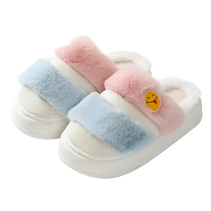 Cotton plush slippers with cashmere lining in a pink and green colour-block design, showing non-slip sole.