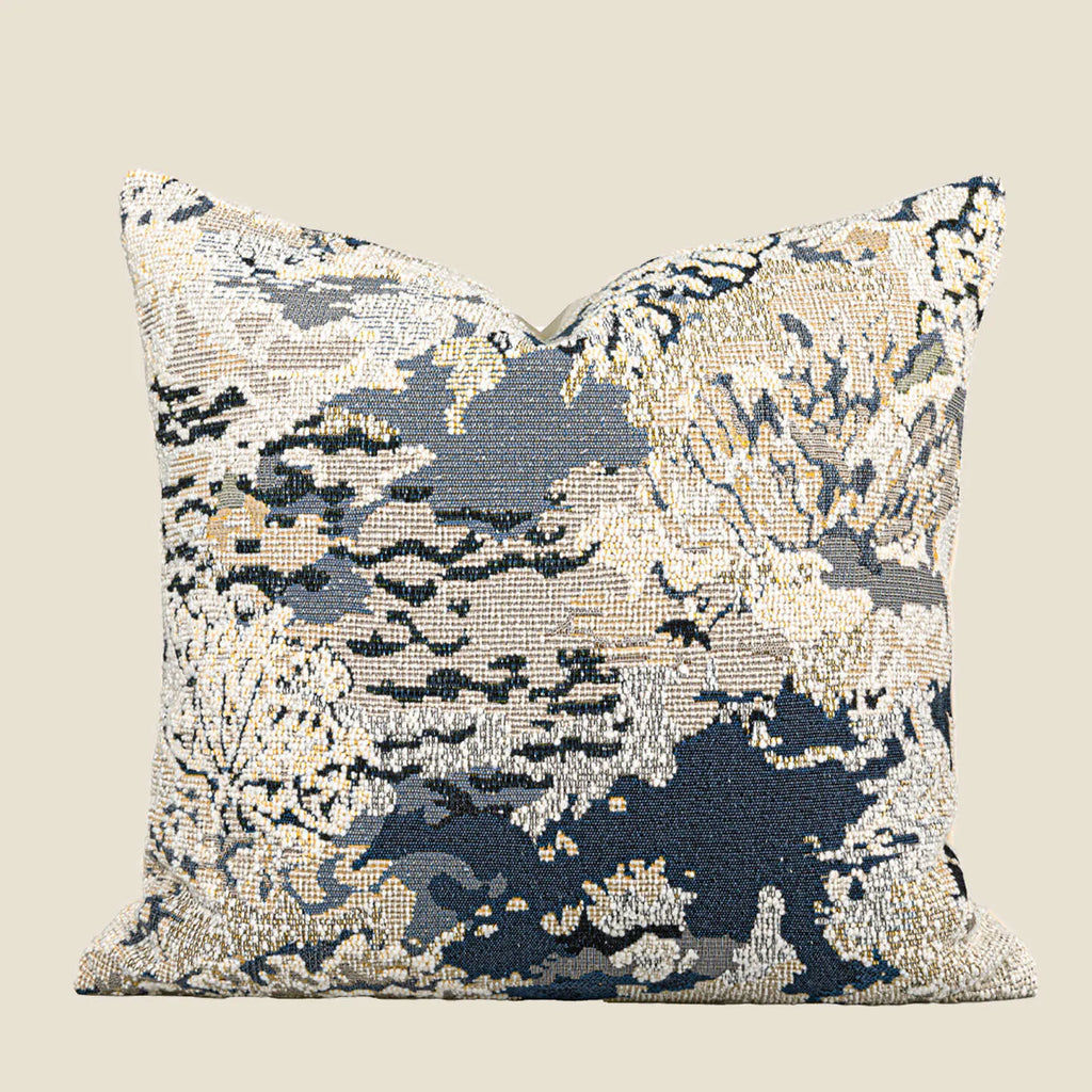 Chinese style antique blue floral pattern decorative cushion with wool blend cover on a sofa.
