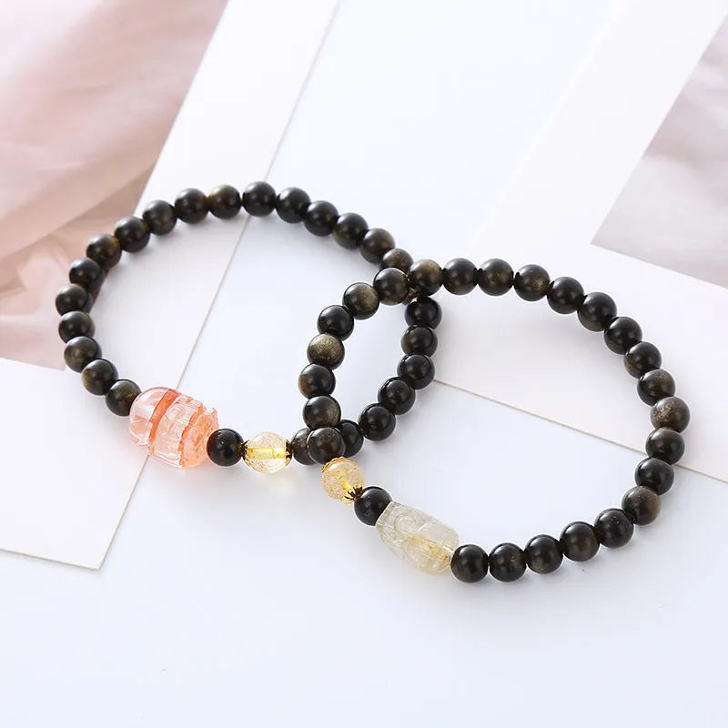 Natural obsidian Pi Xiu bracelet with ethnic retro design on wrist