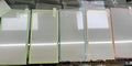 Fluorescent tempered glass full cover screen protector for iPhone in pink, yellow, green, blue, and grass green colours.