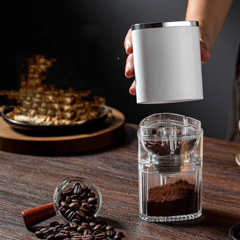 White and black portable electric coffee grinder with ceramic burr and USB charging cable