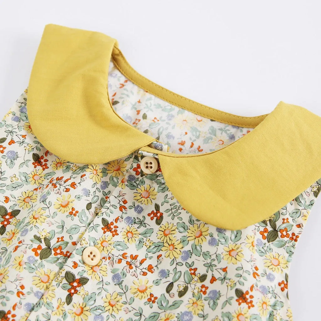 Yellow cotton floral baby romper with doll collar, triangle jumpsuit style for girls 0-6 months to 2-3 years