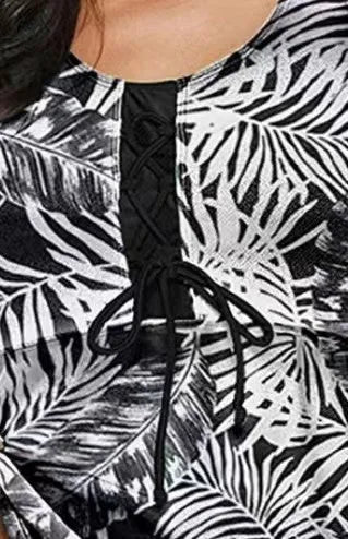 Women's bikini swimsuit with a split bow detail on the front, shown in one of three available colours.