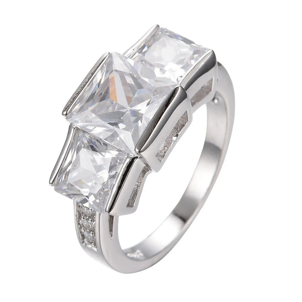 A colourful electroplated copper women's ring with a geometric design, shown in multiple colour options.