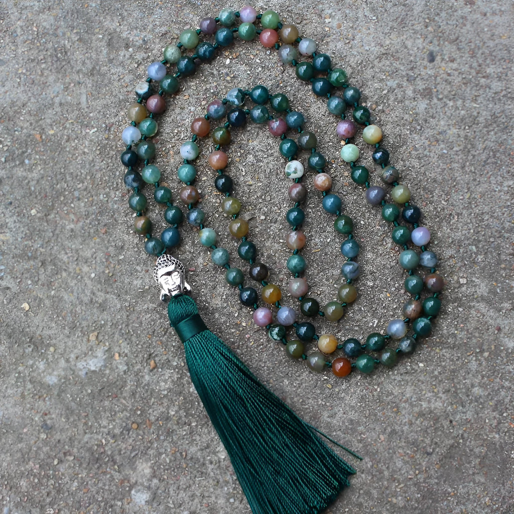 Natural agate bracelet with 108 geometric beads, each measuring 6mm, laid flat.