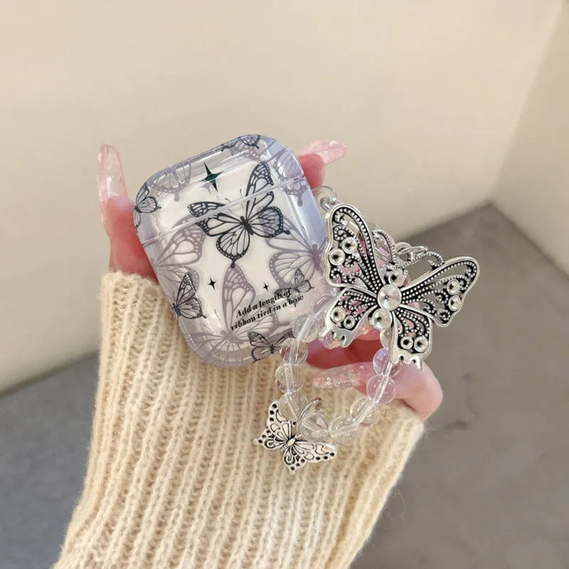 Butterfly TPU protective cover for AirPods with beaded pendant and embossed cartoon design