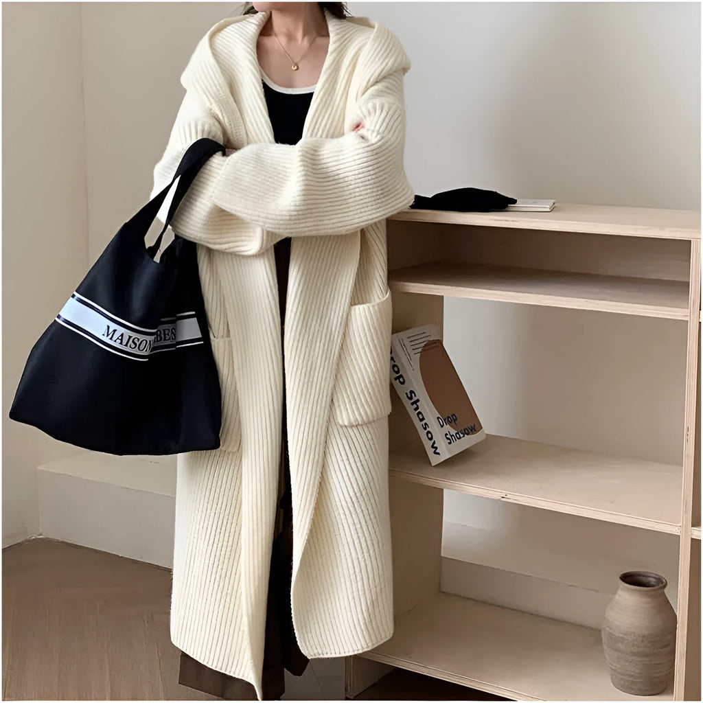 Women's loose grey hooded acrylic cardigan coat with long sleeves, shown open.