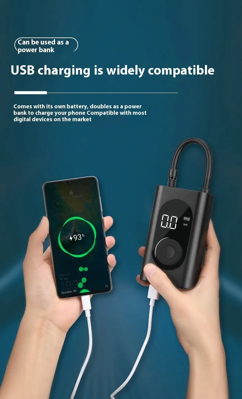 Compact black handheld wireless tyre inflator with digital display, attached air hose, and USB cable.