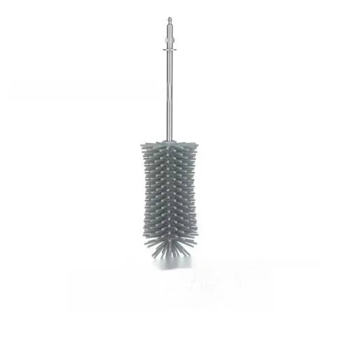 White rechargeable electric cleaning brush with multiple scrubber heads on a kitchen worktop.