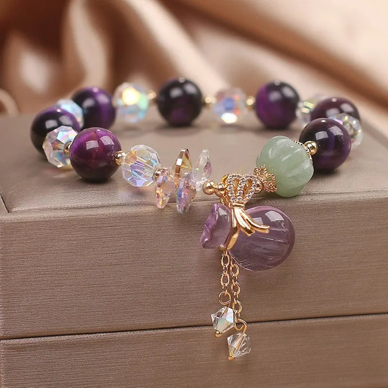 Purple Tigereye money bag pendant transport bracelet with crystal and rhinestone details
