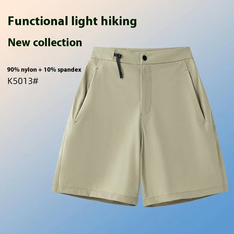 Men's solid colour quick-dry sports shorts with elastic sides for running and climbing.
