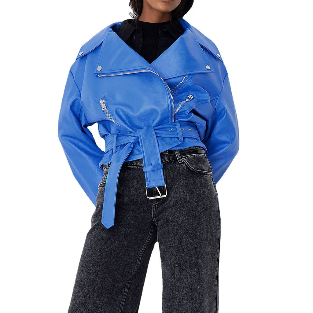 Women's black punk style jacket with a short belt lapel and Peter Pan collar.